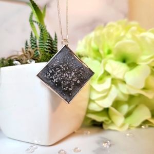 Resin filled Grey necklace on a silver plated necklace